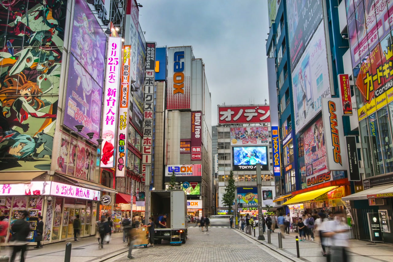 Busy Japanese city street with illuminated signs