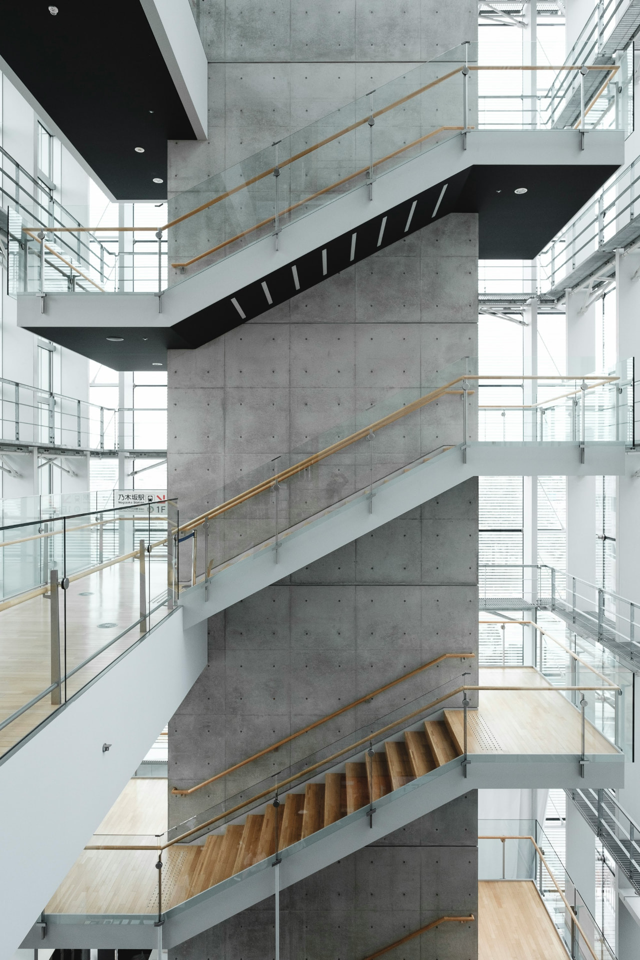 Architectural interior with layered concrete staircases