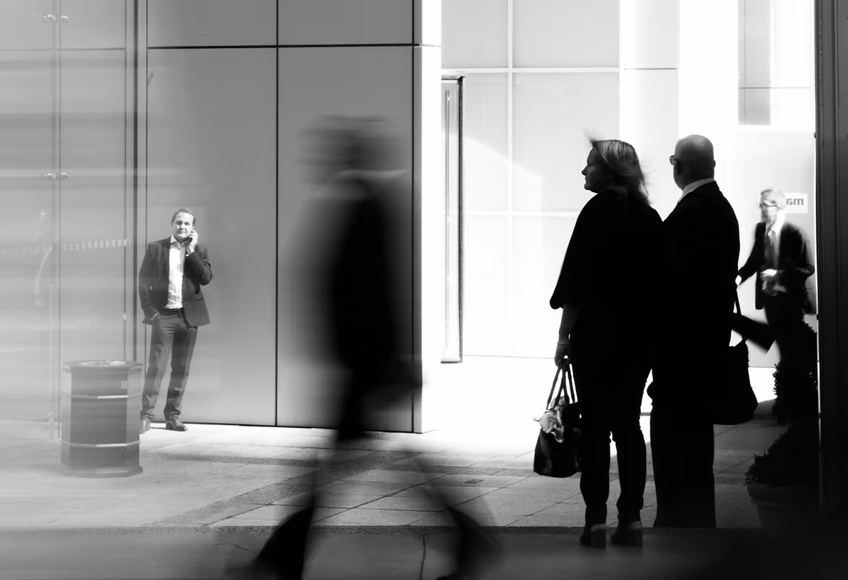 People moving through a contemporary workplace
